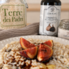 Risotto fichi e zola preparato con Riso Carnaroli Terre dei Padri e completato con Condimento all’Aglio Nero.