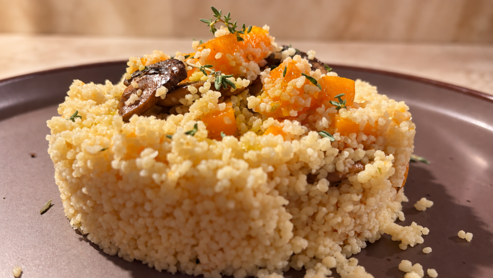 Cous cous con zucca e funghi, timo fresco e Olio al Tartufo Nero