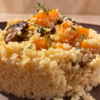 Cous cous con zucca e funghi, timo fresco e Olio al Tartufo Nero